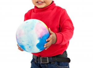 Child holding a ball.