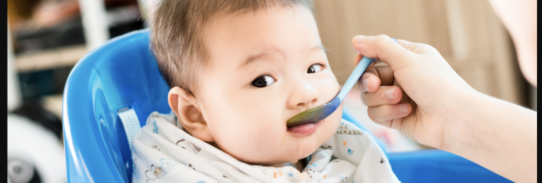 Baby eating soft food